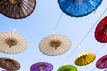 Colorful umbrella lamp decorated outdoor in festival in Thailand.