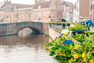 canals and streets of the ancient medieval district of Ghent, Belgium