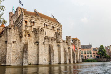 moat with water in front of the castle, Ghent Belgium