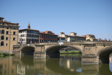 Fototapeta na wymiar Firenze, Italy - June 21, 2018 : View of Ponte Santa Trinita (Holy Trinity bridge), the oldest elliptic arch bridge in the world.