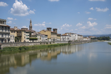 Fototapeta na wymiar Firenze, Italy - June 21, 2018 : View of Lungarno delle Grazie from Ponte Delle Grazie (Grazie bridge)