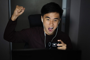 happy man using joystick to playing games © geargodz