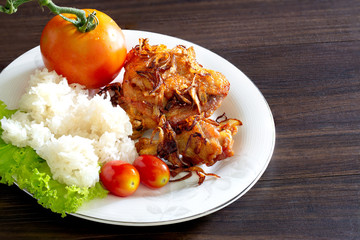 Fried chicken with chili and fifh sauce delicious thai food eating with sticky rice