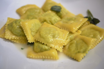 Ravioli pasta with butter and sage