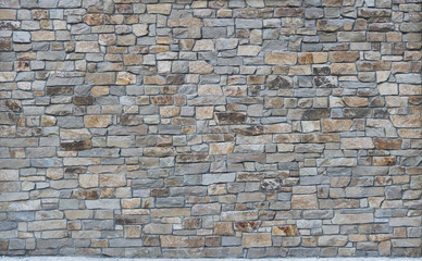 Obraz premium wall made with square and rectangle cut stones with concrete joints
