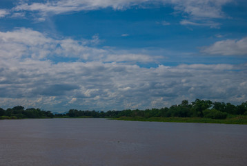 Landscape of rivers and mountains There is a blue sky as the background