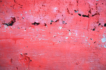 texture of a concrete block painted in red