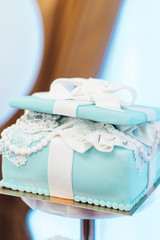 wedding cake with turquoise cakes