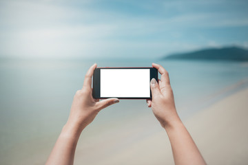 Close up hand of woman holding smartphone