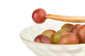 grapes red in bowl grapes red fork isolated on white background