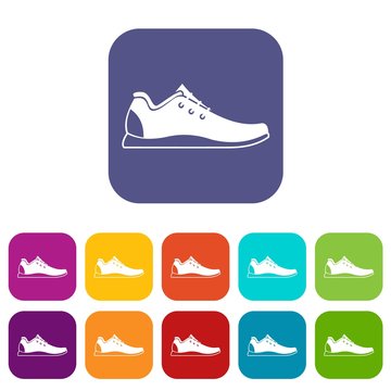 Athletic shoe icons set vector illustration in flat style in colors red, blue, green, and other