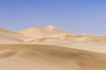 Fototapeta na wymiar Dunes on the Skeleton Coast / Dunes in Sandstorm at Skeleton Coast, Namib Desert, Namibia, Africa.