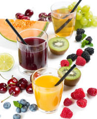 Berry and fruit juices in glasses.