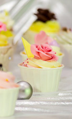 Sweet topping wedding cake decoration./ Sweet beauty flower and topping pastel color on homemade wedding cake decoration.