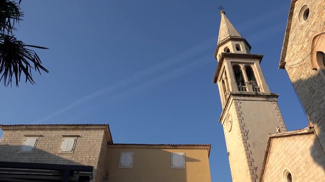 Bell tower of the St. John the Baptist church  in Budva Old town. Montenegro