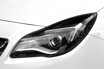 Car headlights. Luxury Headlights. White car