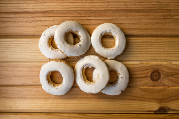 aniseed rolls on wooden table