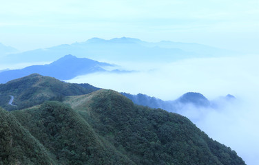 View of mountains with sea of clouds at blue dusk ~ The magnificent mountainous scenery and nice weather have made Yangmingshan National Park an attractive summer resort