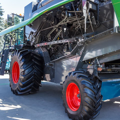 Harvester for agricultural work, modern agricultural transport working in the field, modern harvester close-up