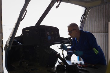 Engineer examining cockpit