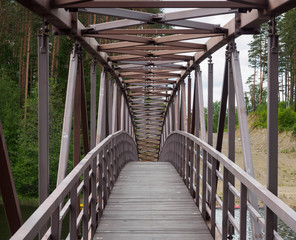A wooden bridge across the river