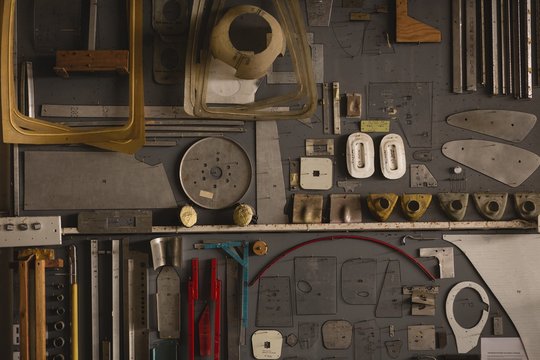 Various tools and equipments arranged on pegboard