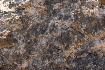 Naklejka premium Brown stone wall, background, texture