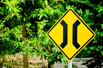 Narrow bridge sign in country road