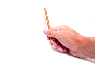 Pencil in the hand of a student on a white background, side view