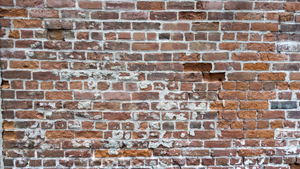interior exposed brick red and orange with grey cemented joints