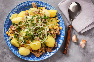 Stewed lamb with potatoes and chikpeas.