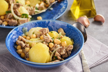 Stewed lamb with potatoes and chikpeas.