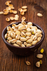 Sea Salt Roasted Pistachios Background. Selective focus.