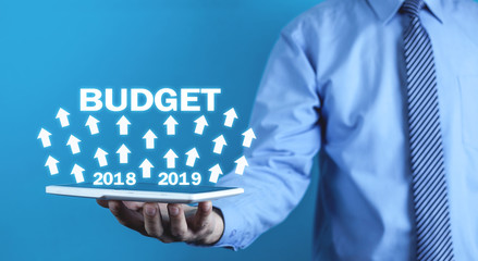 Businessman holding Budget 2018- 2019. Business concept