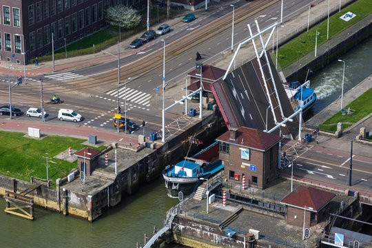 Ship passing a sluice-gate