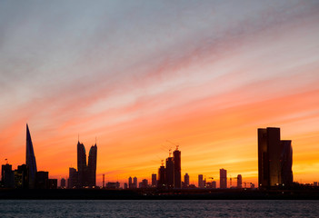 Bahrain skyline and dramatic sky at sunset