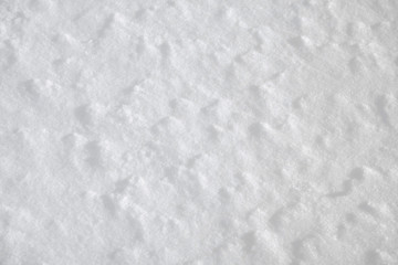 Background winter texture of white and blue clean crystal of snow