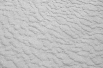 Background winter texture of white and blue clean crystal of snow