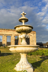 Fototapeta premium Ruins of 18th century classical palace, manor complex at sunset, situated on the Nida River near Jedrzejow, Sobkow, Poland