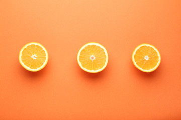 Orange fruit on colorful background