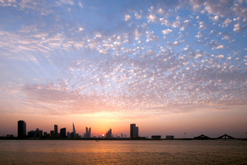 Bahrain skyline and beautiful clouds during sunset