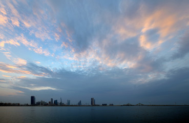  Bahrain skyline  and dramatic clouds at  sunset
