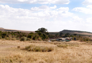 Tourists enjyoing game drive in Masai Mara National Reserve