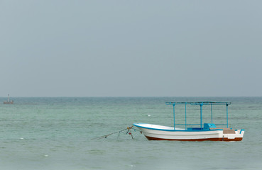 A fishing boat at Busaiteen beach, Bahrain