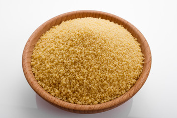 fresh couscous on a white acrylic background