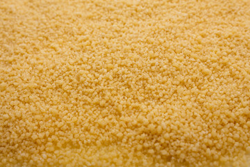 fresh couscous on a white acrylic background