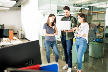 Business people working on a laptop in office