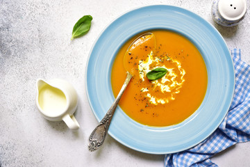 Delicious pumpkin soup.Top view with copy space.