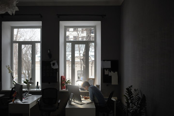 A man working in a modern design office 