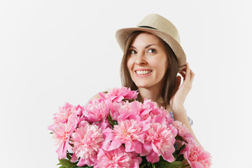 Close up of young woman in dress, hat holding bouquet of beautiful pink peonies flowers isolated on white background. St. Valentine's Day, International Women's Day holiday concept. Advertising area.
